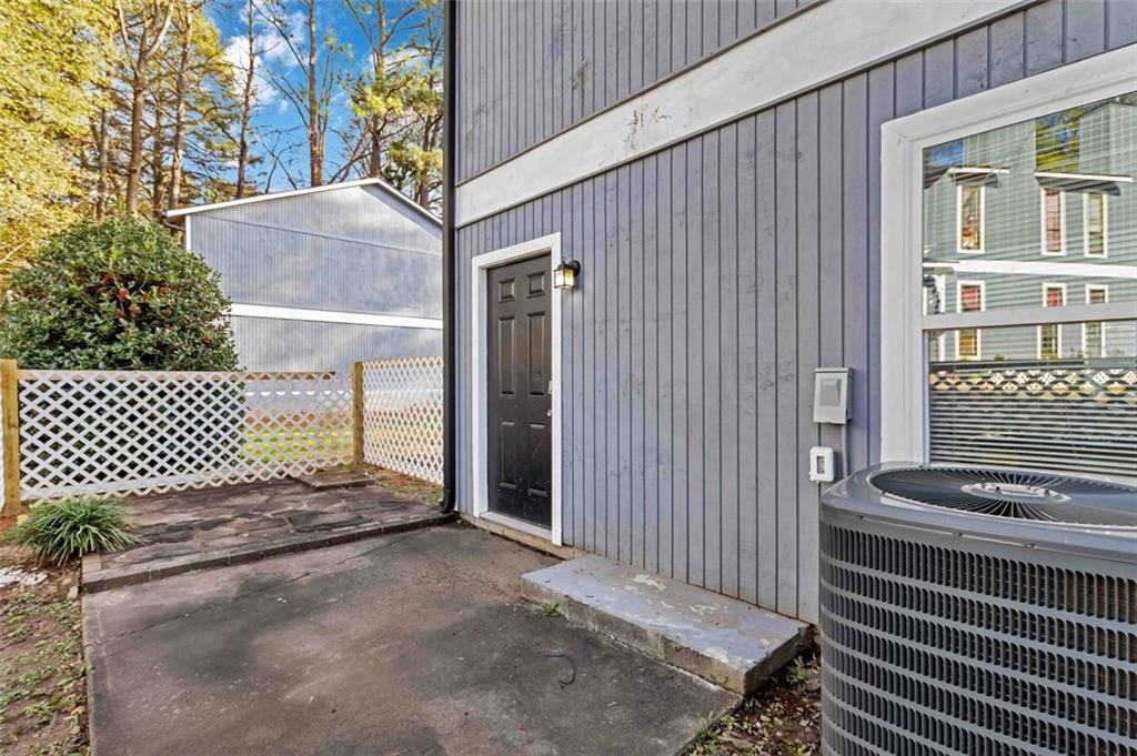 2340 Beaver Ruin Road, Unit 16 Norcross, GA 30071 - Photo 22 of 28 a backyard of a house