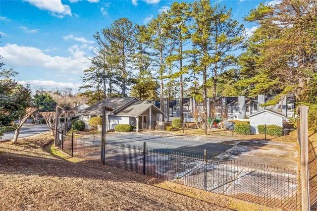 a view of a houses with a park