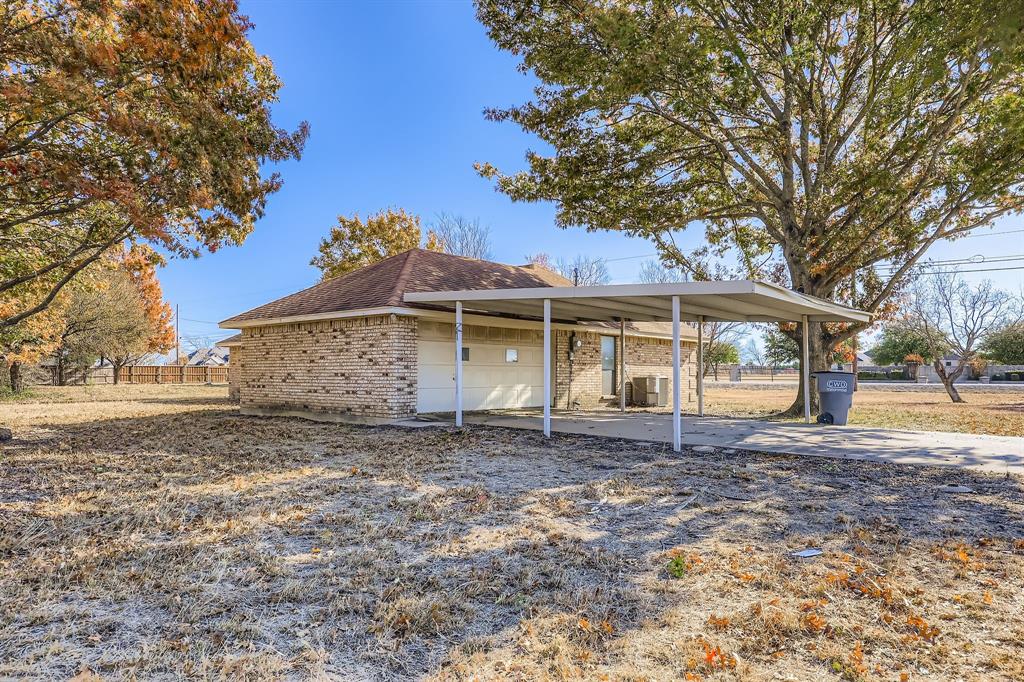 655 East Reindeer Road Lancaster, TX 75146 - Photo 6 of 6 Brick home with garage sitting on nearly 1 acre.