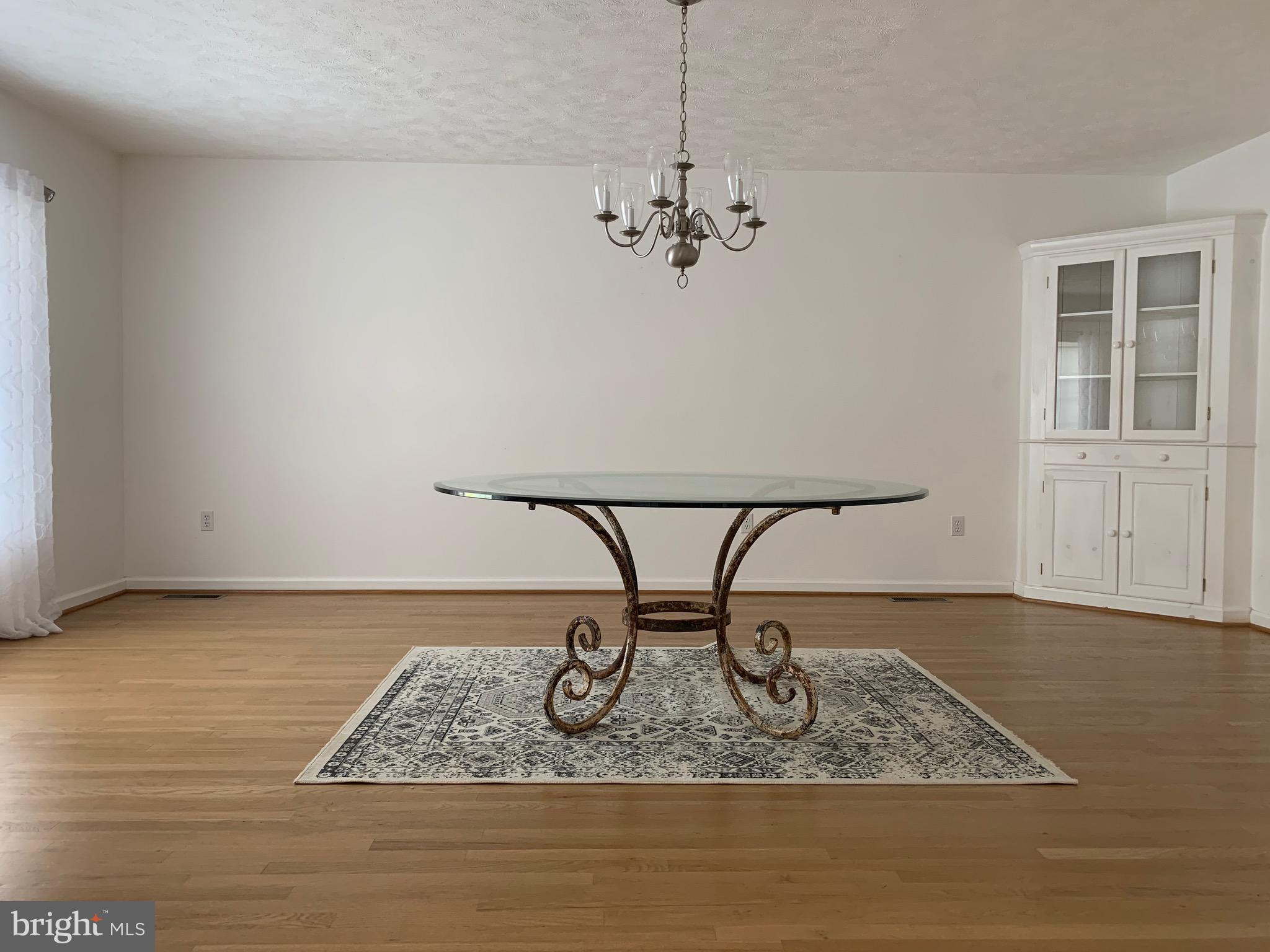 8474 Leeds Manor Road Warrenton, VA 20186 - Photo 22 of 38 dining room with custom built in and natural light