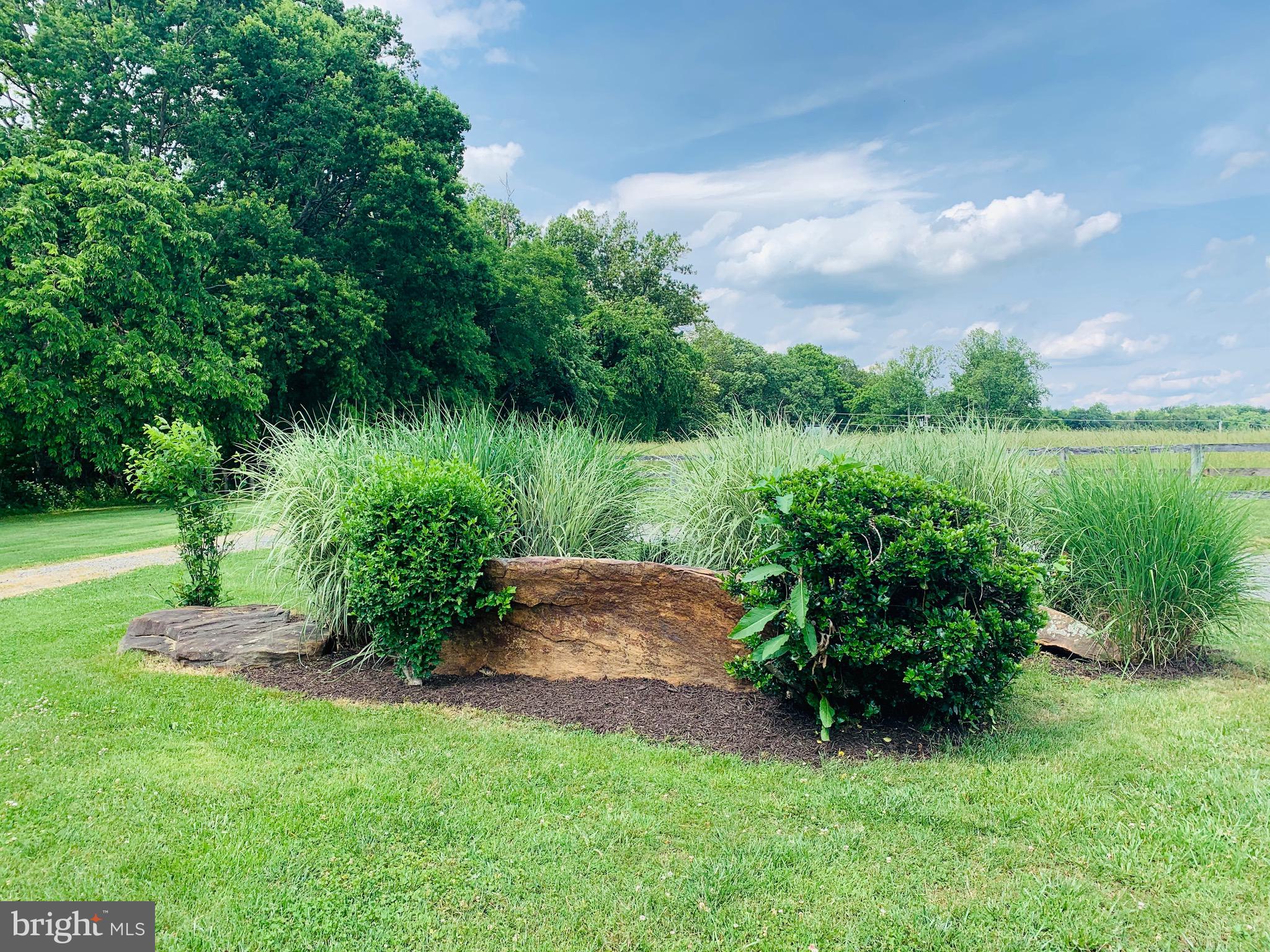 8474 Leeds Manor Road Warrenton, VA 20186 - Photo 8 of 38 circular driveway around professional landscaping
