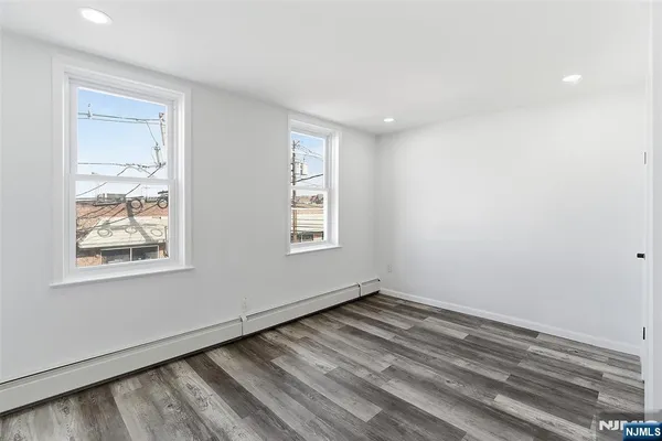 a view of a room that has a window in it