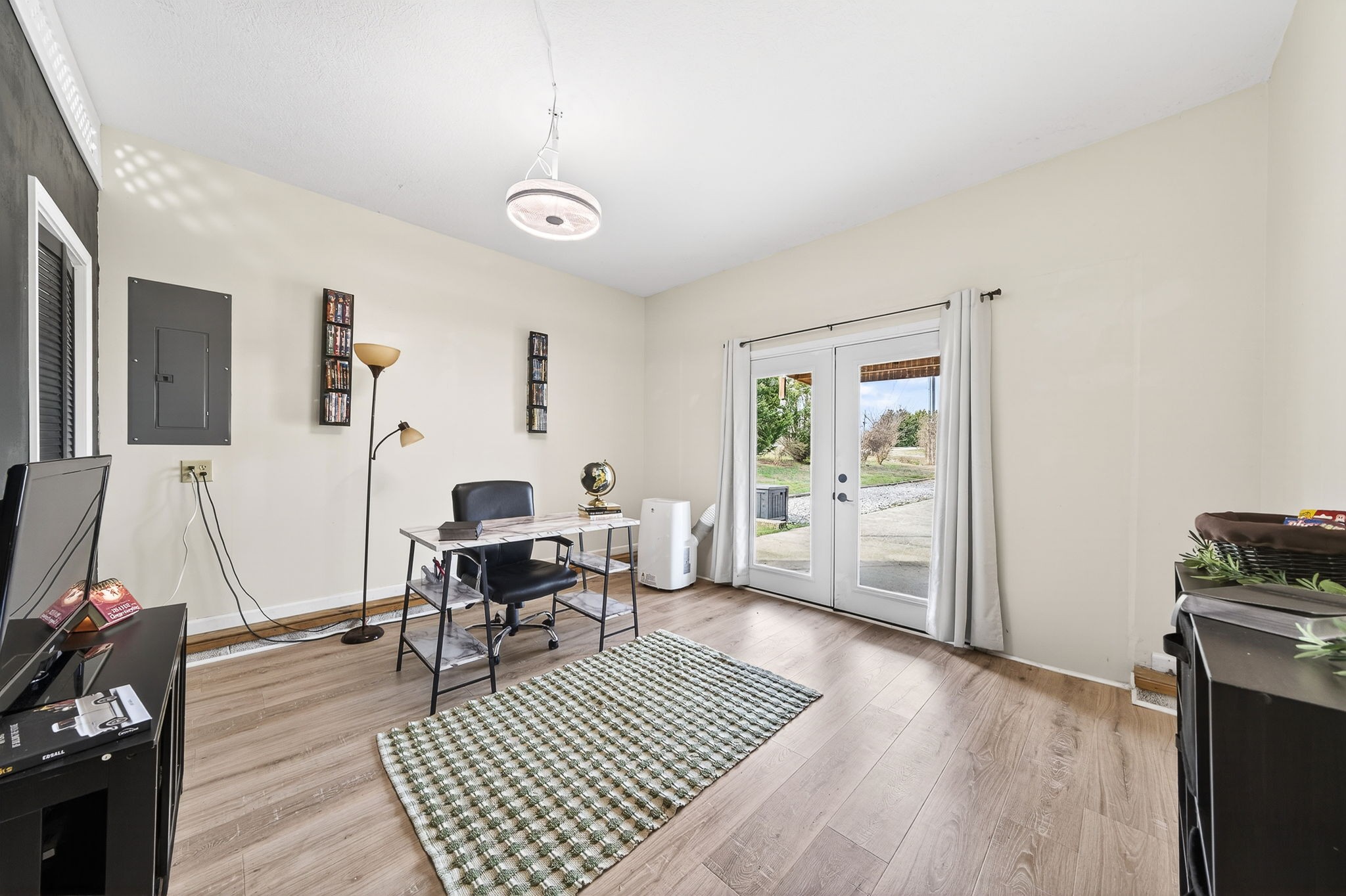 4535 Ewing Drive Baxter, TN 38544 - Photo 11 of 32 a living room with furniture a window and a table