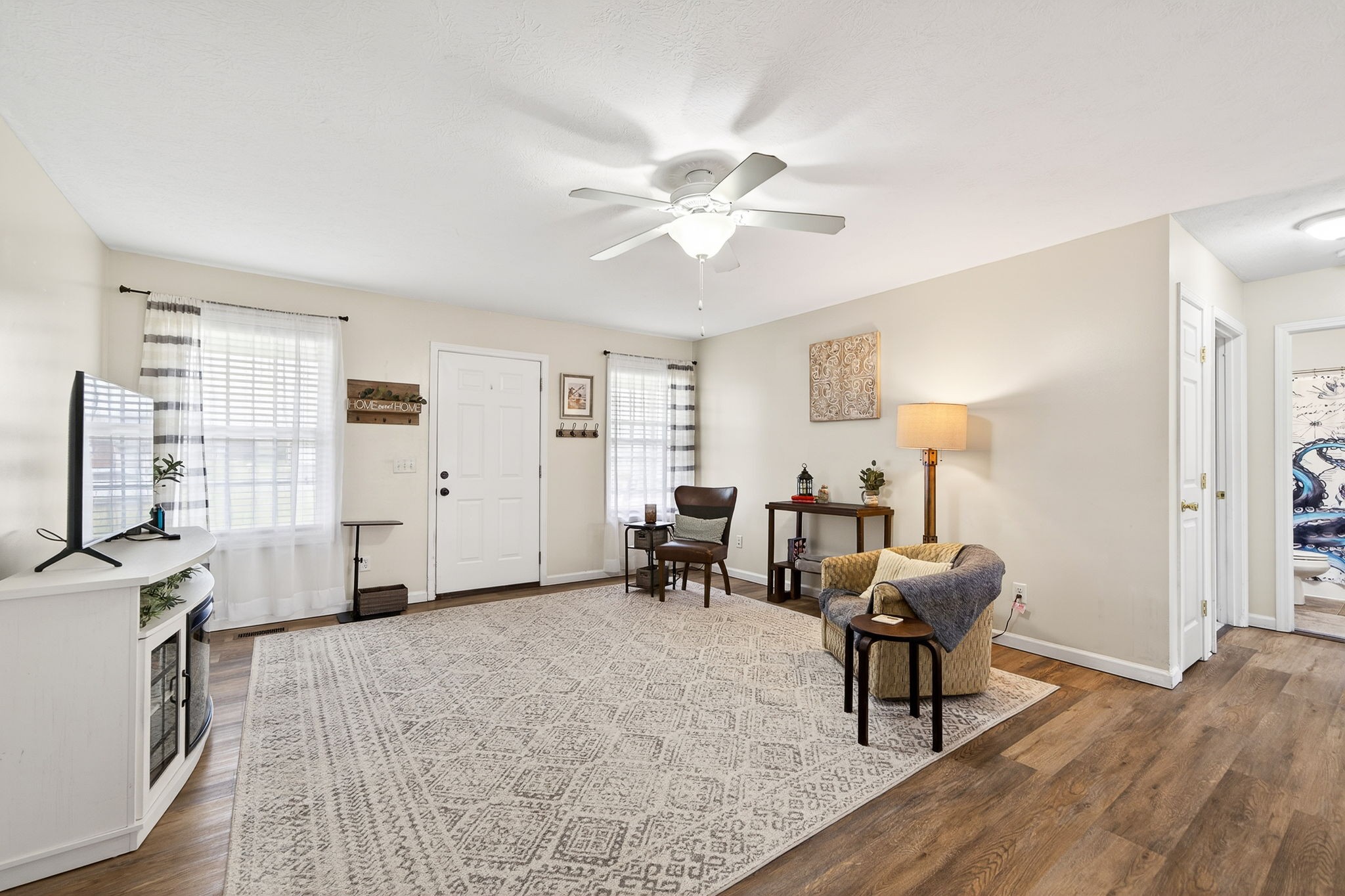 4535 Ewing Drive Baxter, TN 38544 - Photo 2 of 32 a living room with furniture and a flat screen tv