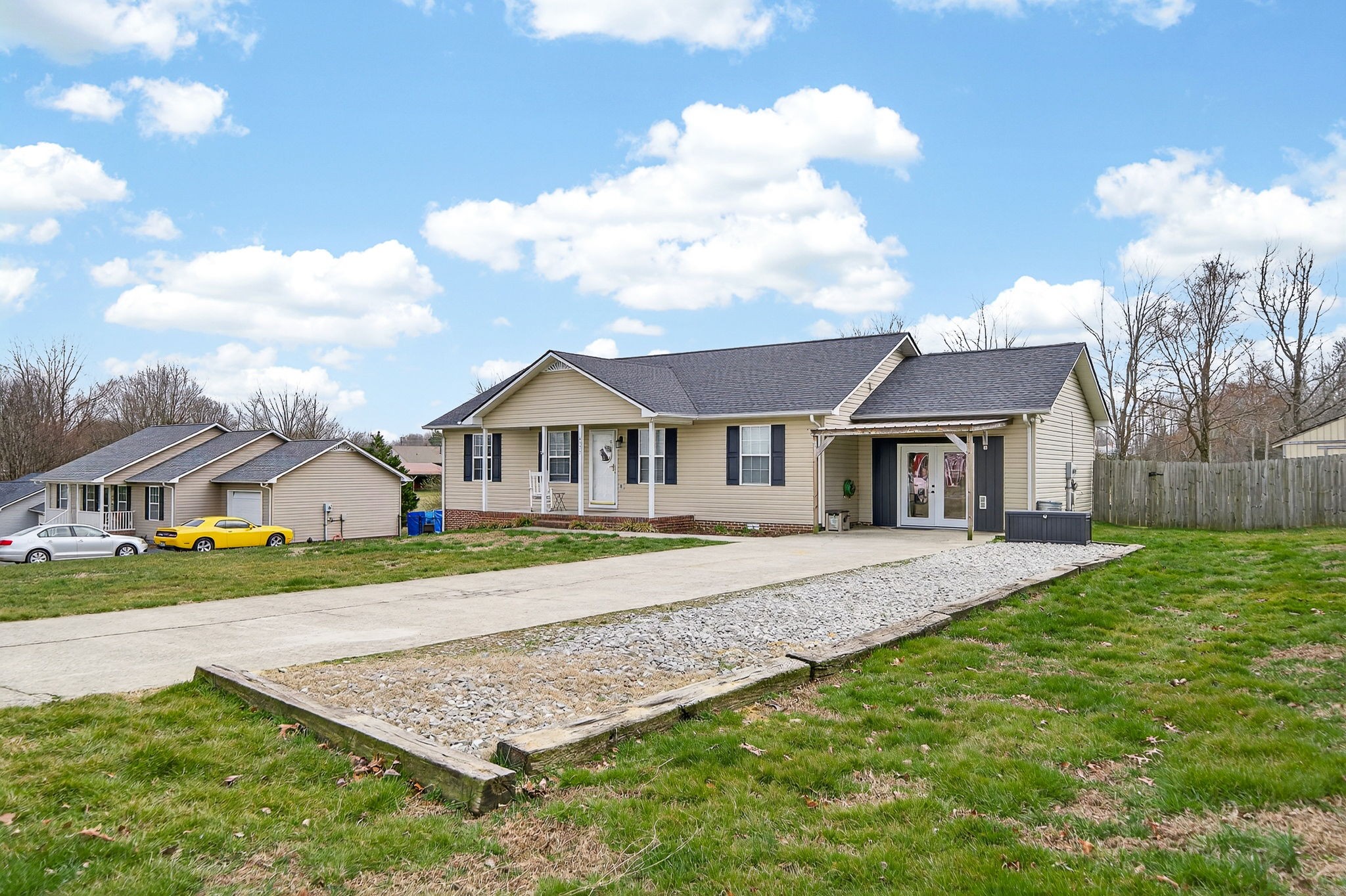 4535 Ewing Drive Baxter, TN 38544 - Photo 26 of 32 a front view of a house with a yard