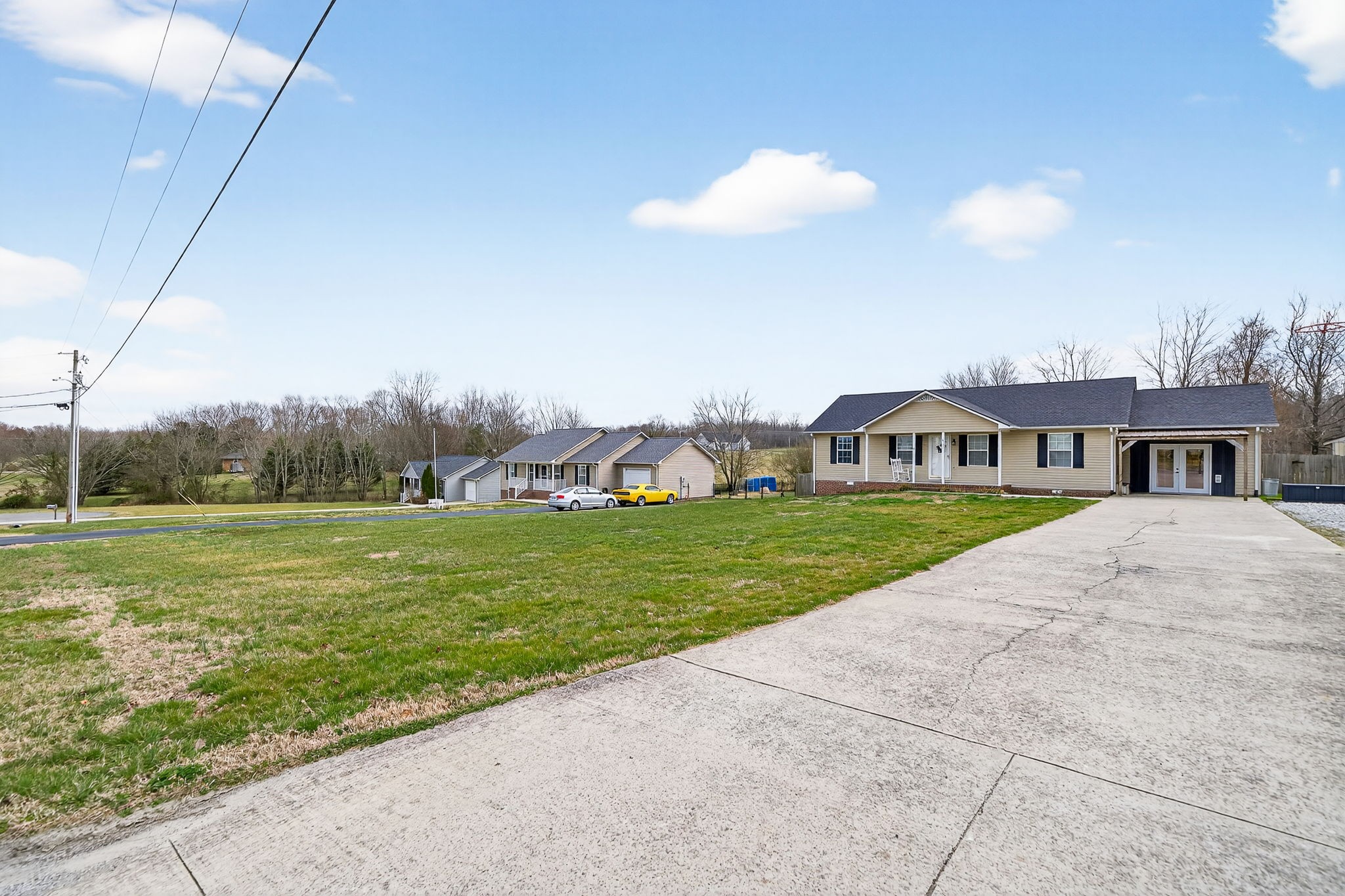 4535 Ewing Drive Baxter, TN 38544 - Photo 28 of 32 a front view of house with garden