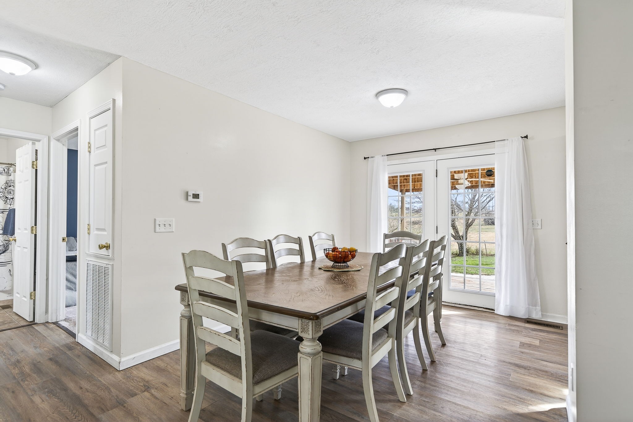 4535 Ewing Drive Baxter, TN 38544 - Photo 6 of 32 a view of a dining room with furniture and wooden floor
