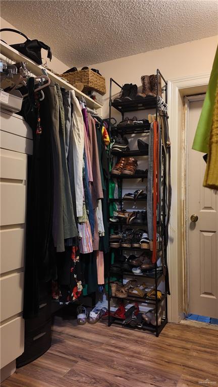 905 West Bowe Street Pharr, TX 78577 - Photo 10 of 12 a view of walk in closet with clothes and shoes