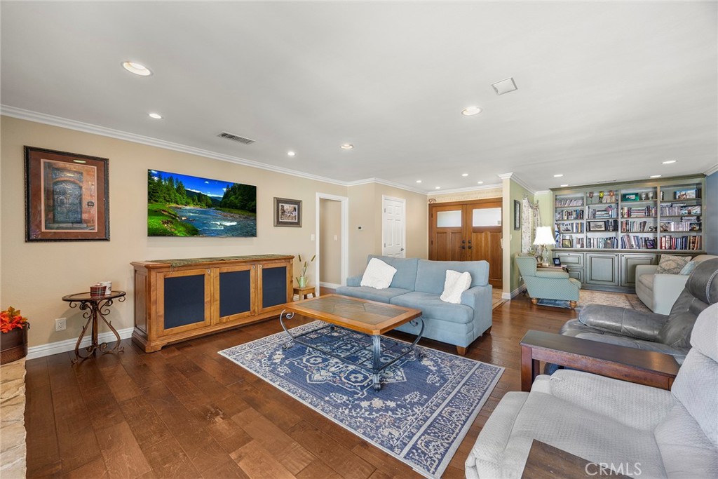 1019 Eadington Drive Brea, CA 92821 - Photo 5 of 22 a living room with furniture a flat screen tv and a fireplace