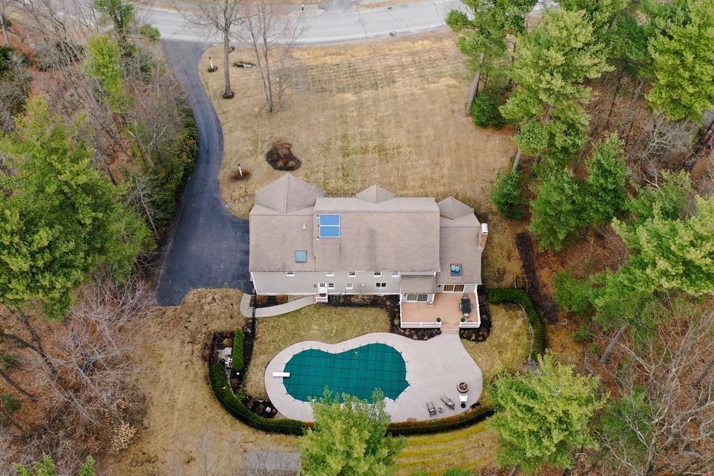 184 Fox Run Road Bolton, MA 01740 - Photo 32 of 39 an aerial view of a house with a swimming pool