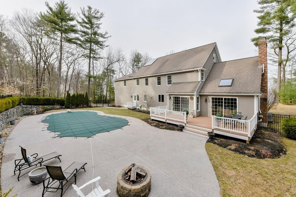 184 Fox Run Road Bolton, MA 01740 - Photo 33 of 39 a view of a house with backyard and sitting area