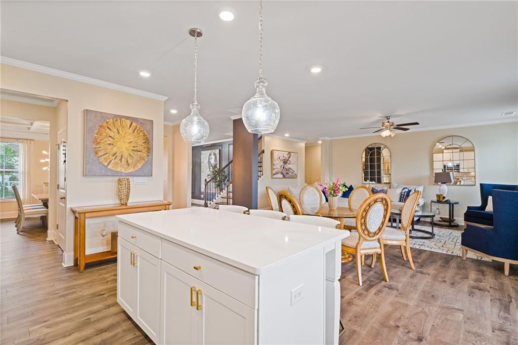 304 Ellenton Place Canton, GA 30115 - Photo 31 of 76 a large kitchen with a table and chairs