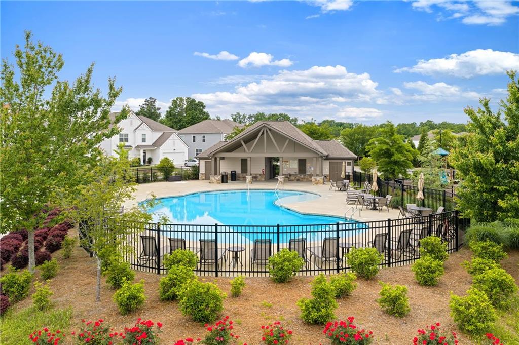 304 Ellenton Place Canton, GA 30115 - Photo 64 of 76 a view of house with outdoor space and street view