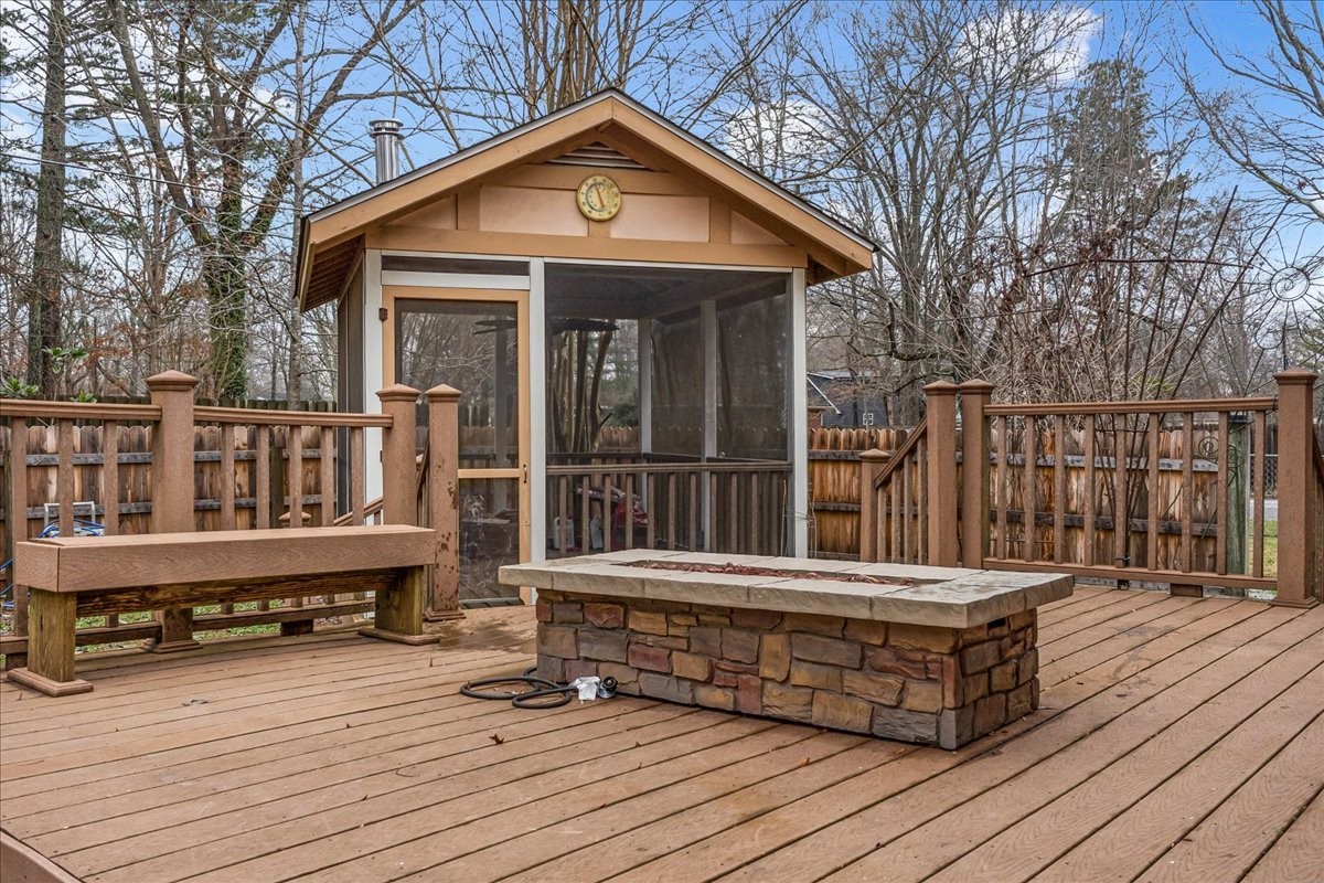300 Marbeth Lane Tullahoma, TN 37388 - Photo 13 of 50 a view of wooden deck with a table and chairs