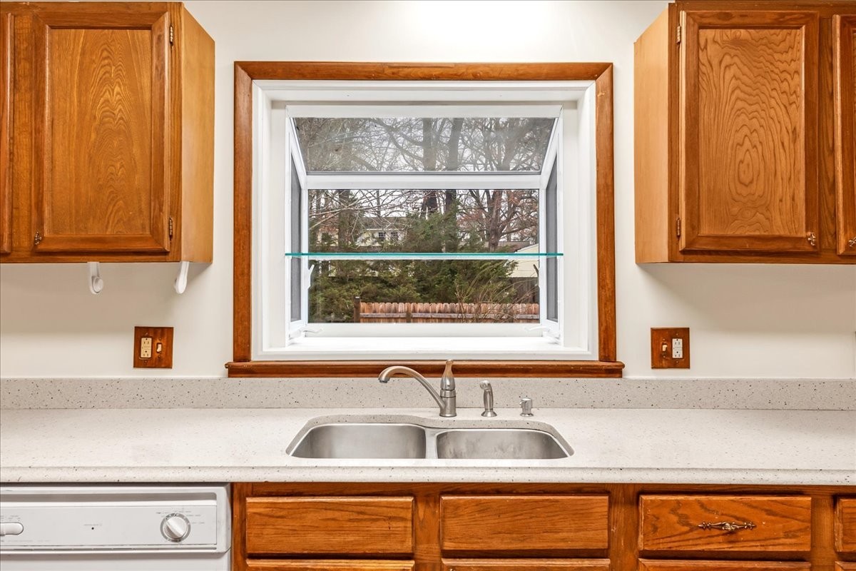 300 Marbeth Lane Tullahoma, TN 37388 - Photo 25 of 50 a kitchen with granite countertop a sink and a window