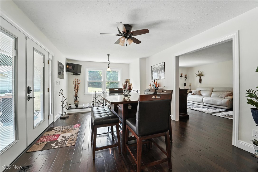 2930 South Ridge Road East Kingsville, OH 44048 - Photo 10 of 49 Sun room area featuring dark wood-style flooring, french doors, a ceiling fan