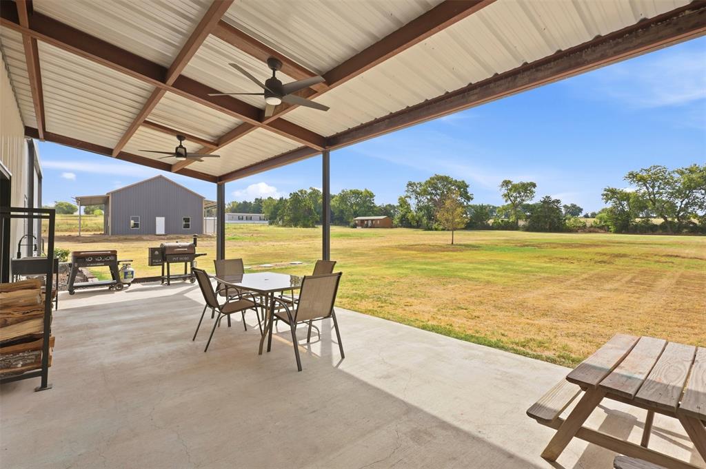 208 Chicken Field Road Whitewright, TX 75491 - Photo 31 of 40 Large back patio