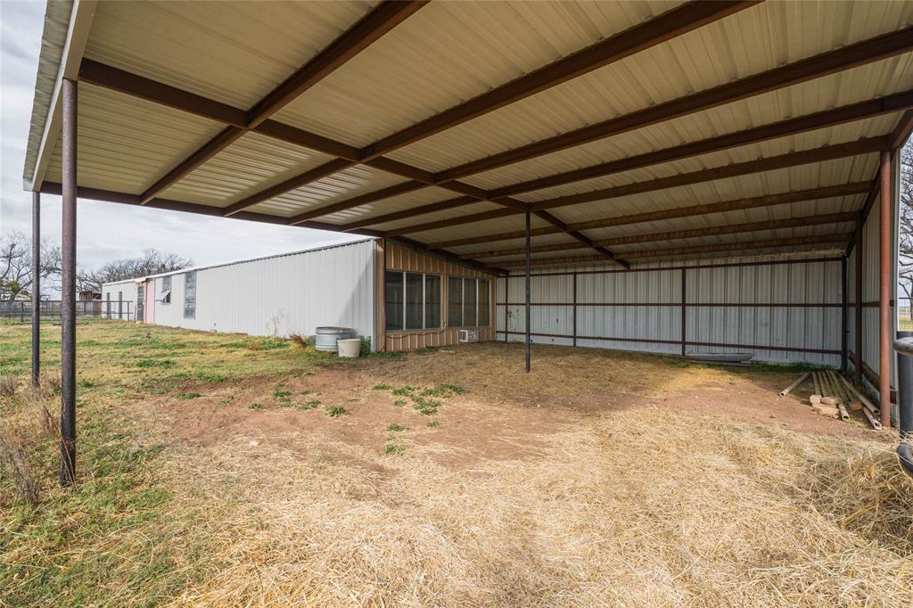 101 South Jacob Lane Winters, TX 79567 - Photo 32 of 38 a view of a backyard of a house