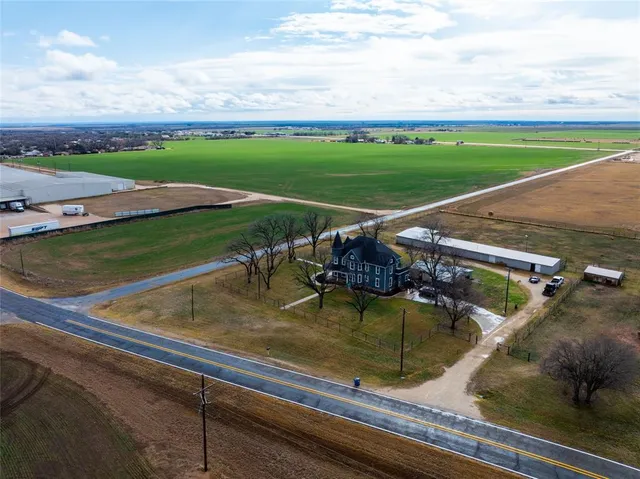 a view of a swimming pool with a lounge chair