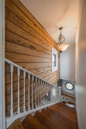a view of a balcony with wooden floor