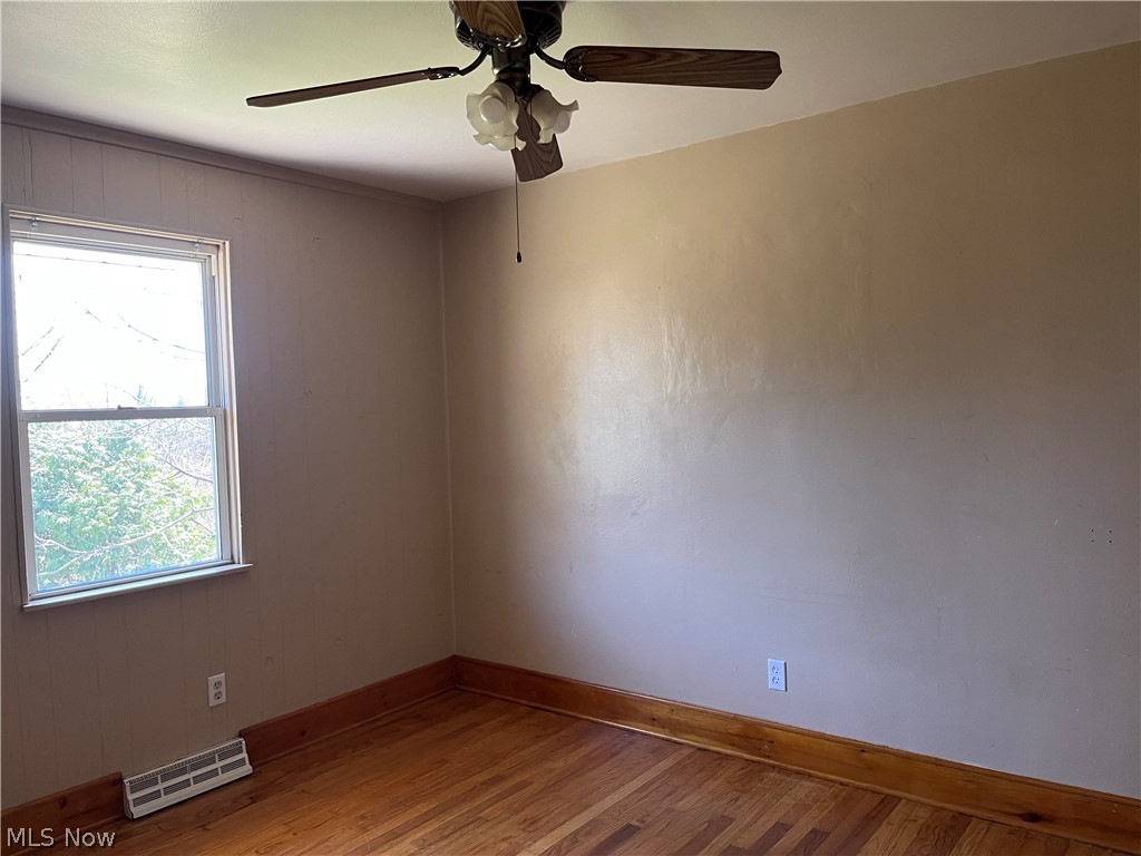 182 Culler Road Weirton, WV 26062 - Photo 11 of 23 Bedroom with ceiling fan and hardwood flooring