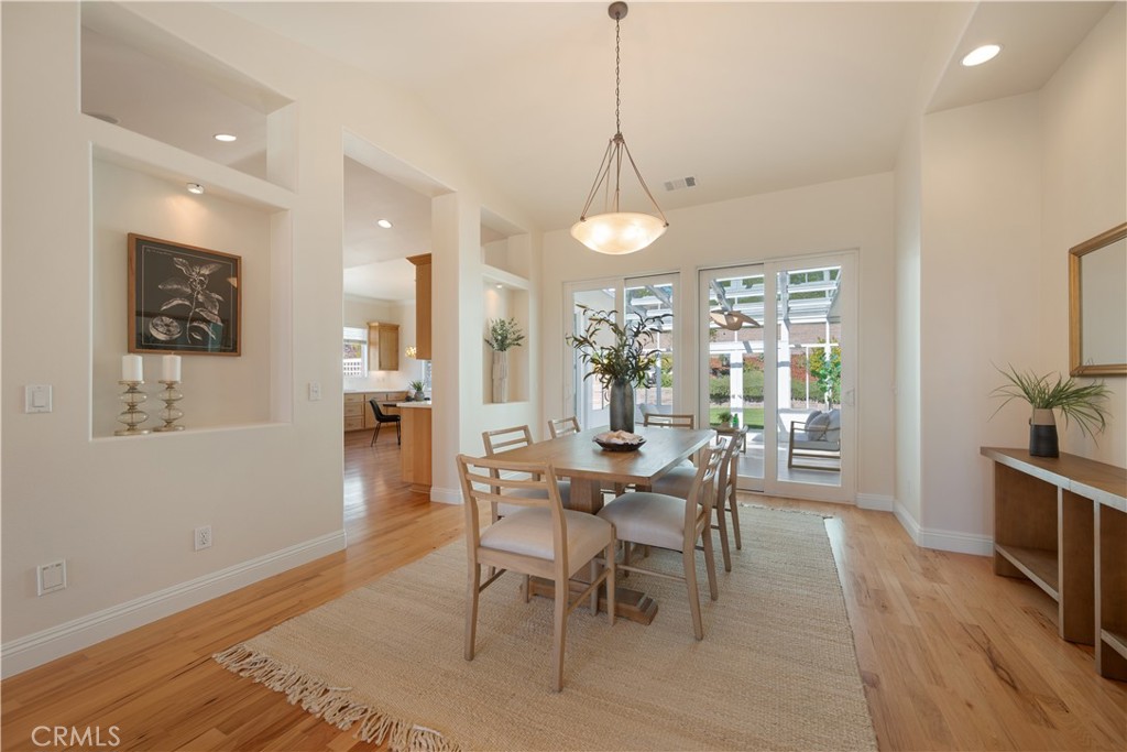 920 Wigeon Way Arroyo Grande, CA 93420 - Photo 13 of 57 a view of a dining room with furniture window and wooden floor