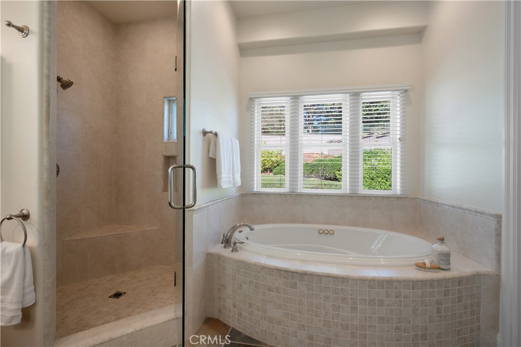 920 Wigeon Way Arroyo Grande, CA 93420 - Photo 19 of 57 a white bath tub sitting next to a window