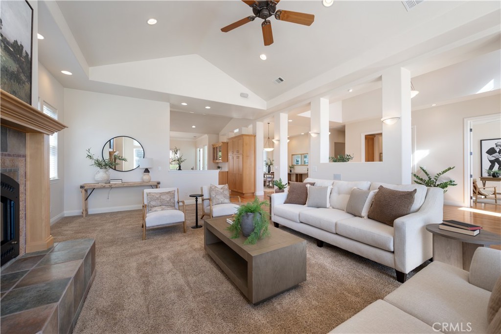 920 Wigeon Way Arroyo Grande, CA 93420 - Photo 2 of 57 a living room with furniture a rug and a chandelier