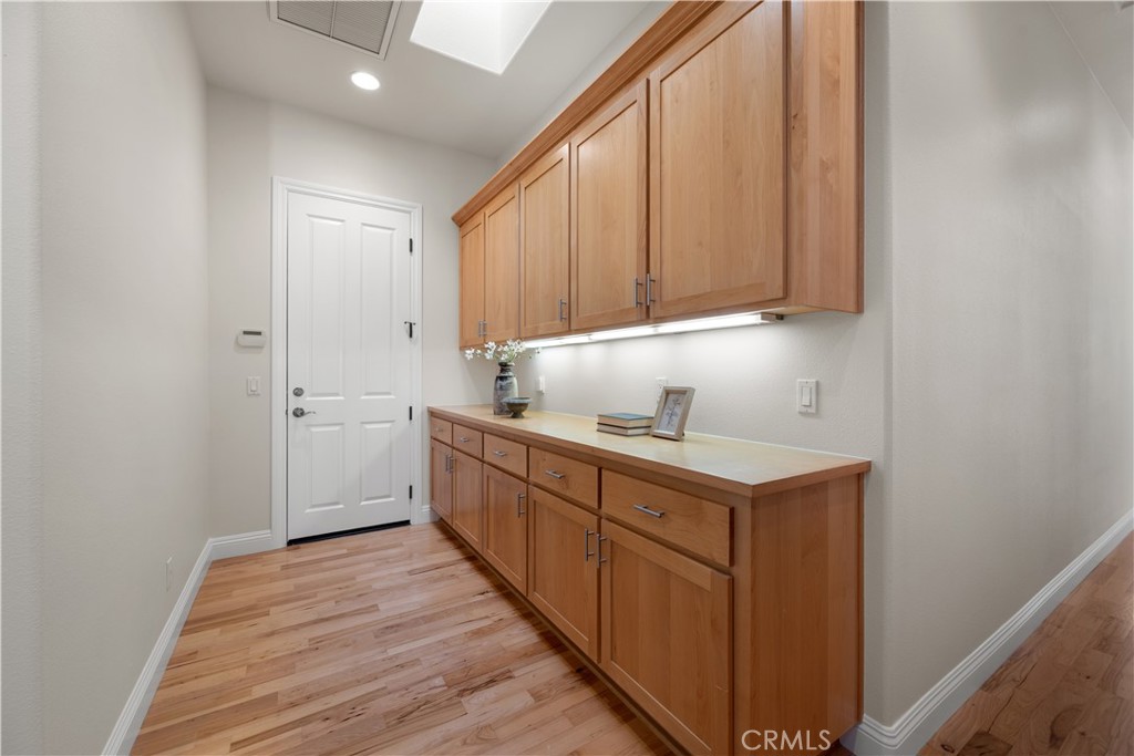 920 Wigeon Way Arroyo Grande, CA 93420 - Photo 33 of 57 a kitchen with a sink and cabinets