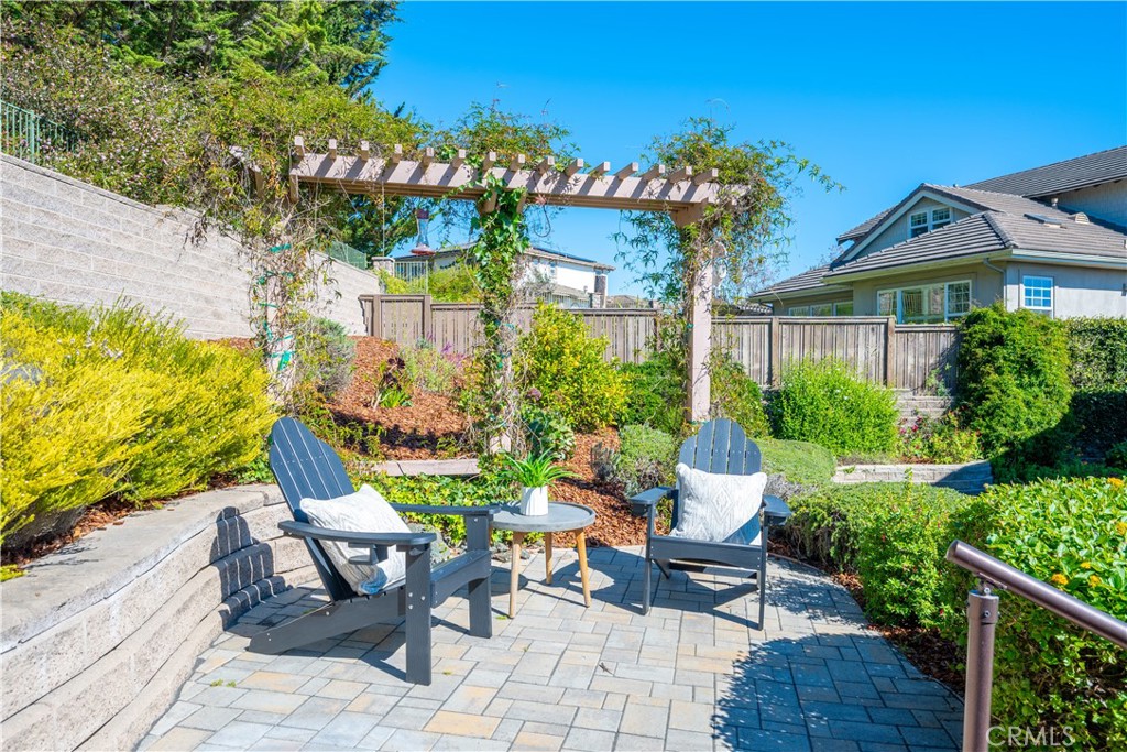 920 Wigeon Way Arroyo Grande, CA 93420 - Photo 40 of 57 a view of a patio with couches table and chairs and potted plants