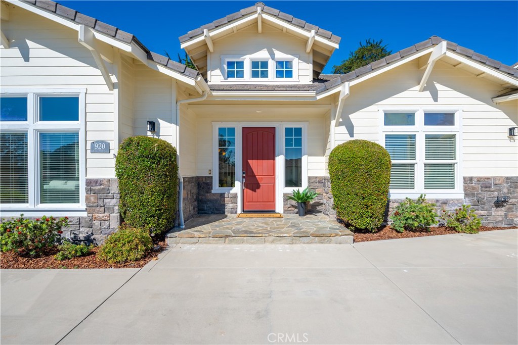 920 Wigeon Way Arroyo Grande, CA 93420 - Photo 50 of 57 a front view of a house with a garden