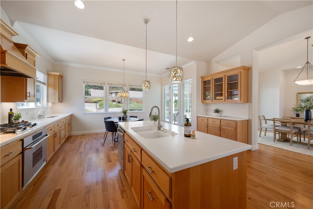 920 Wigeon Way Arroyo Grande, CA 93420 - Photo 7 of 57 a kitchen with sink stove and wooden floor