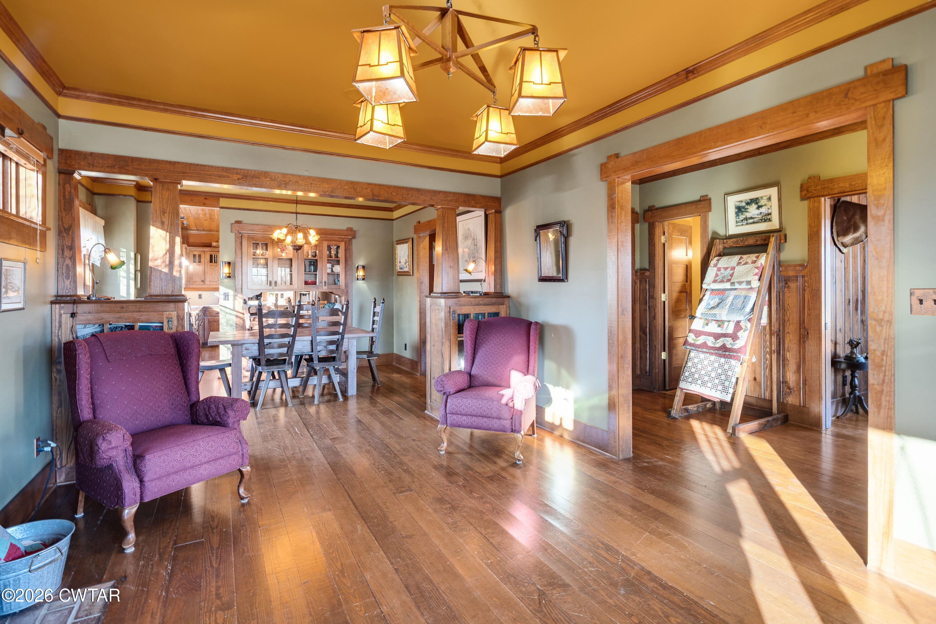 117 Pleasant Hill Road Humboldt, TN 38343 - Photo 12 of 45 a view of a dining room with furniture wooden floor and a chandelier