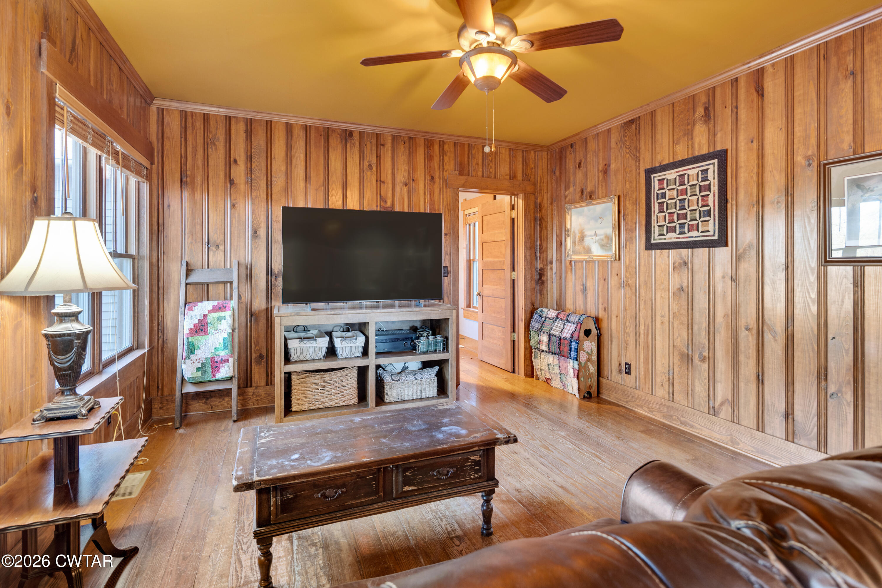 117 Pleasant Hill Road Humboldt, TN 38343 - Photo 18 of 45 a living room with furniture and a flat screen tv