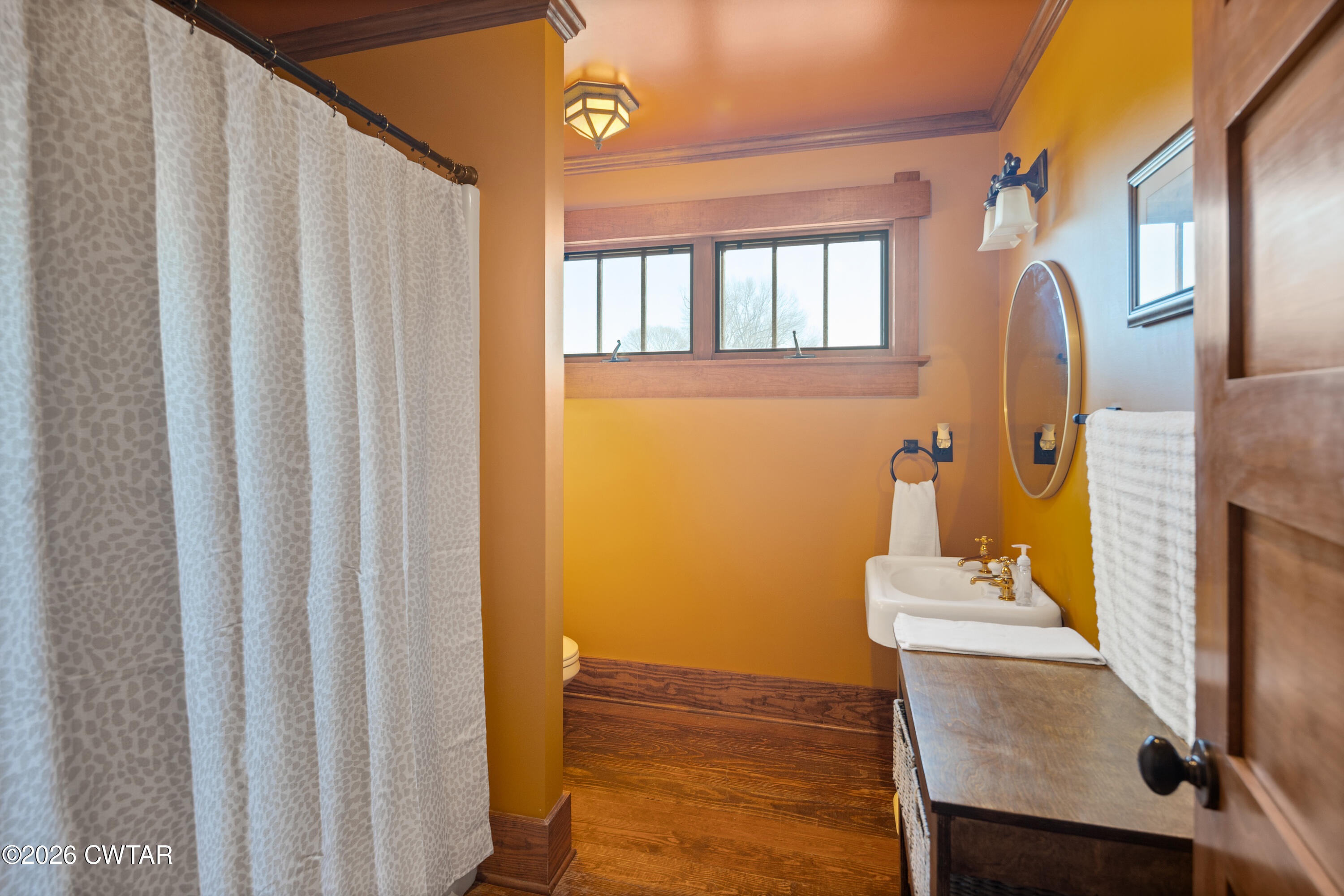 117 Pleasant Hill Road Humboldt, TN 38343 - Photo 28 of 45 a view of a room with wooden floor and windows