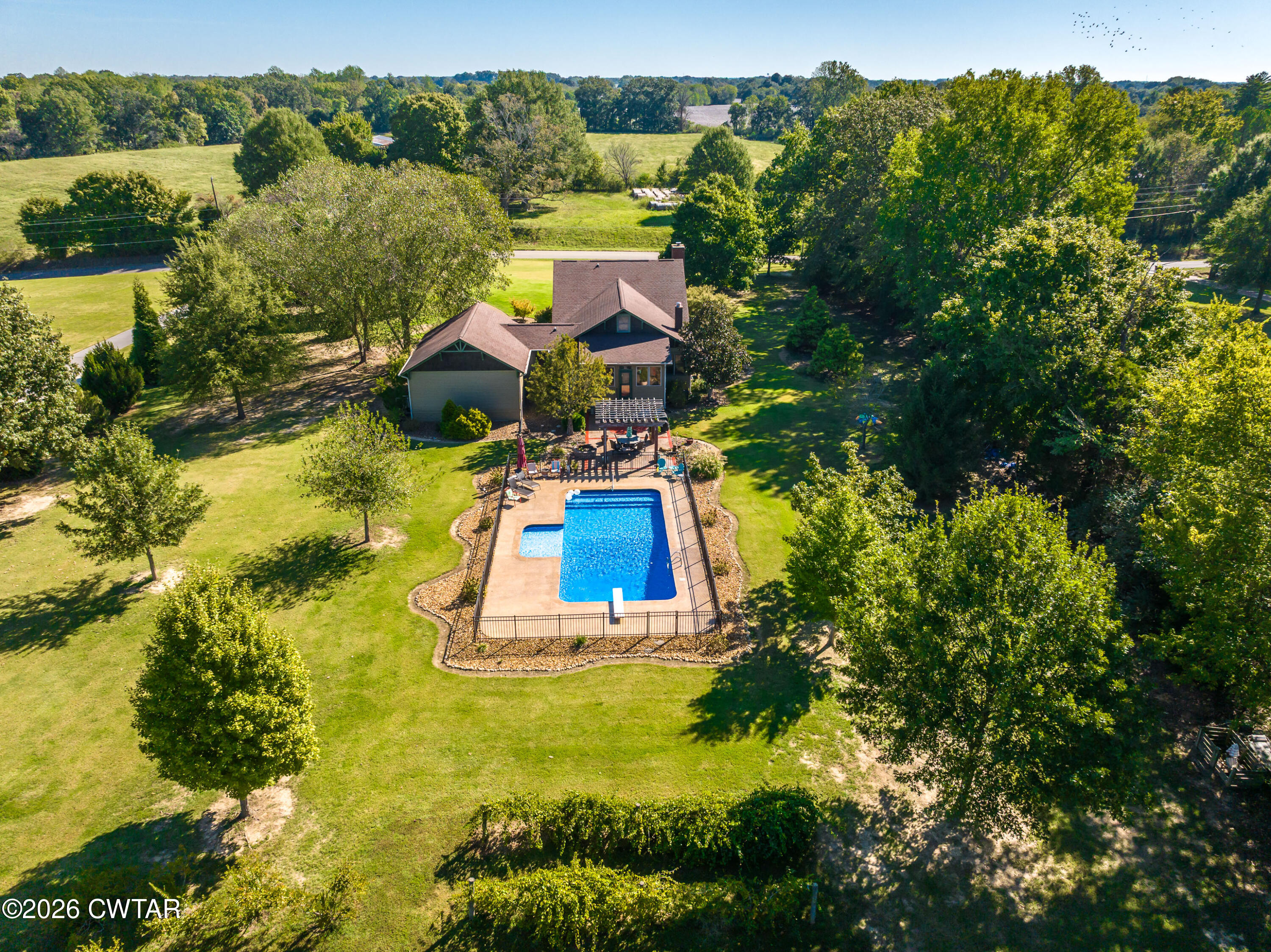 117 Pleasant Hill Road Humboldt, TN 38343 - Photo 33 of 45 a view of a house with a mountain in the background