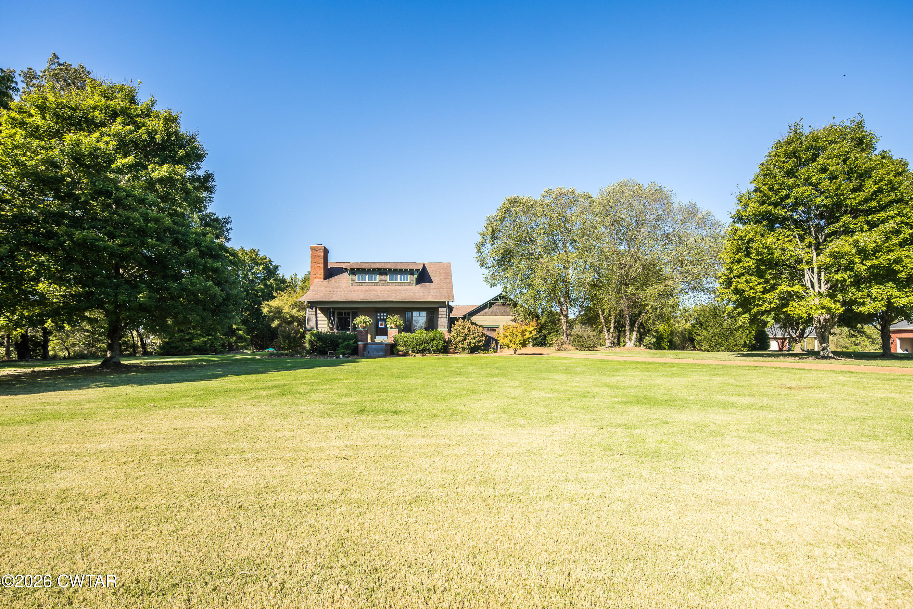 117 Pleasant Hill Road Humboldt, TN 38343 - Photo 34 of 45 a view of a large pool with an outdoor space and seating area