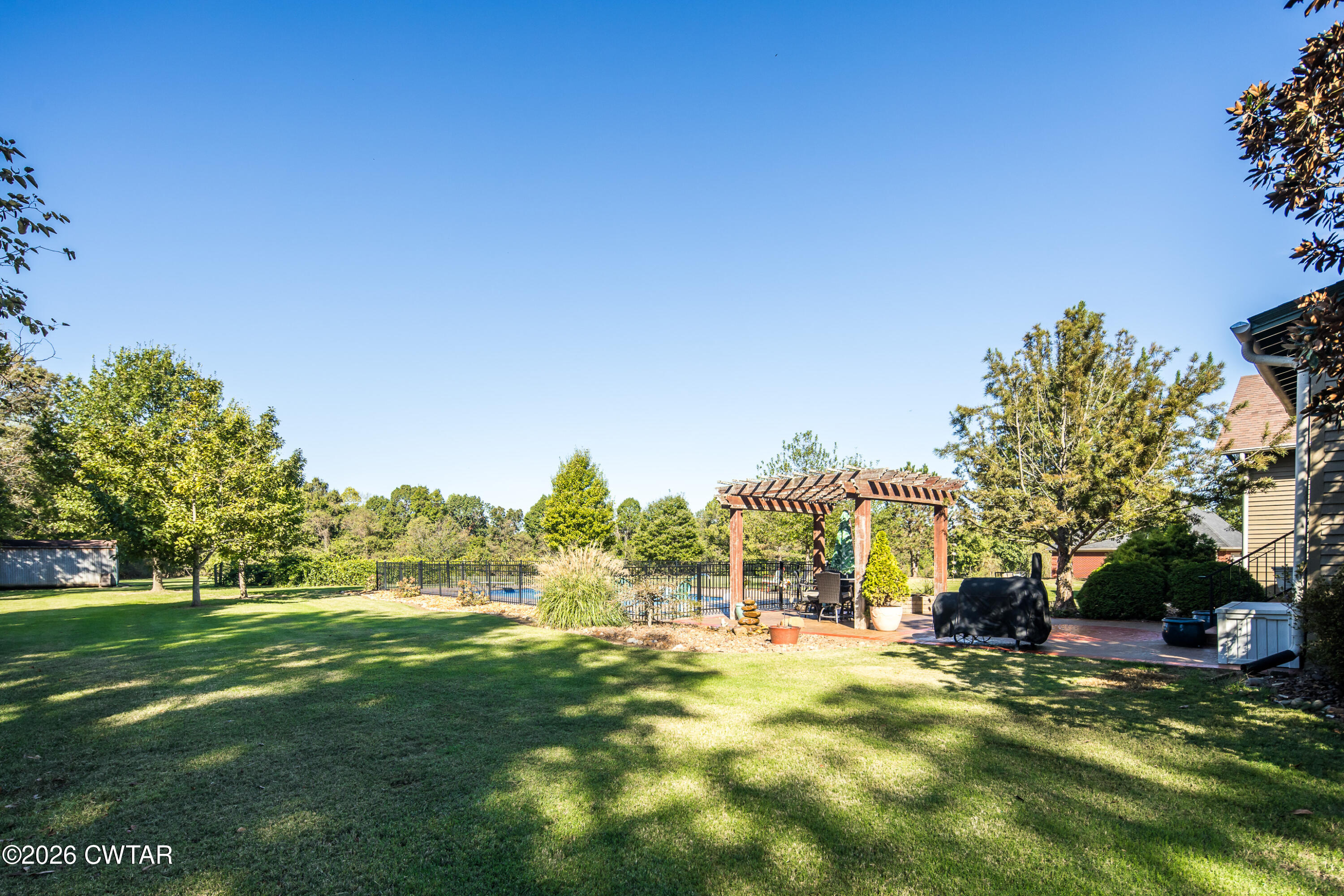 117 Pleasant Hill Road Humboldt, TN 38343 - Photo 36 of 45 a view of a fountain in front of a house with a big yard