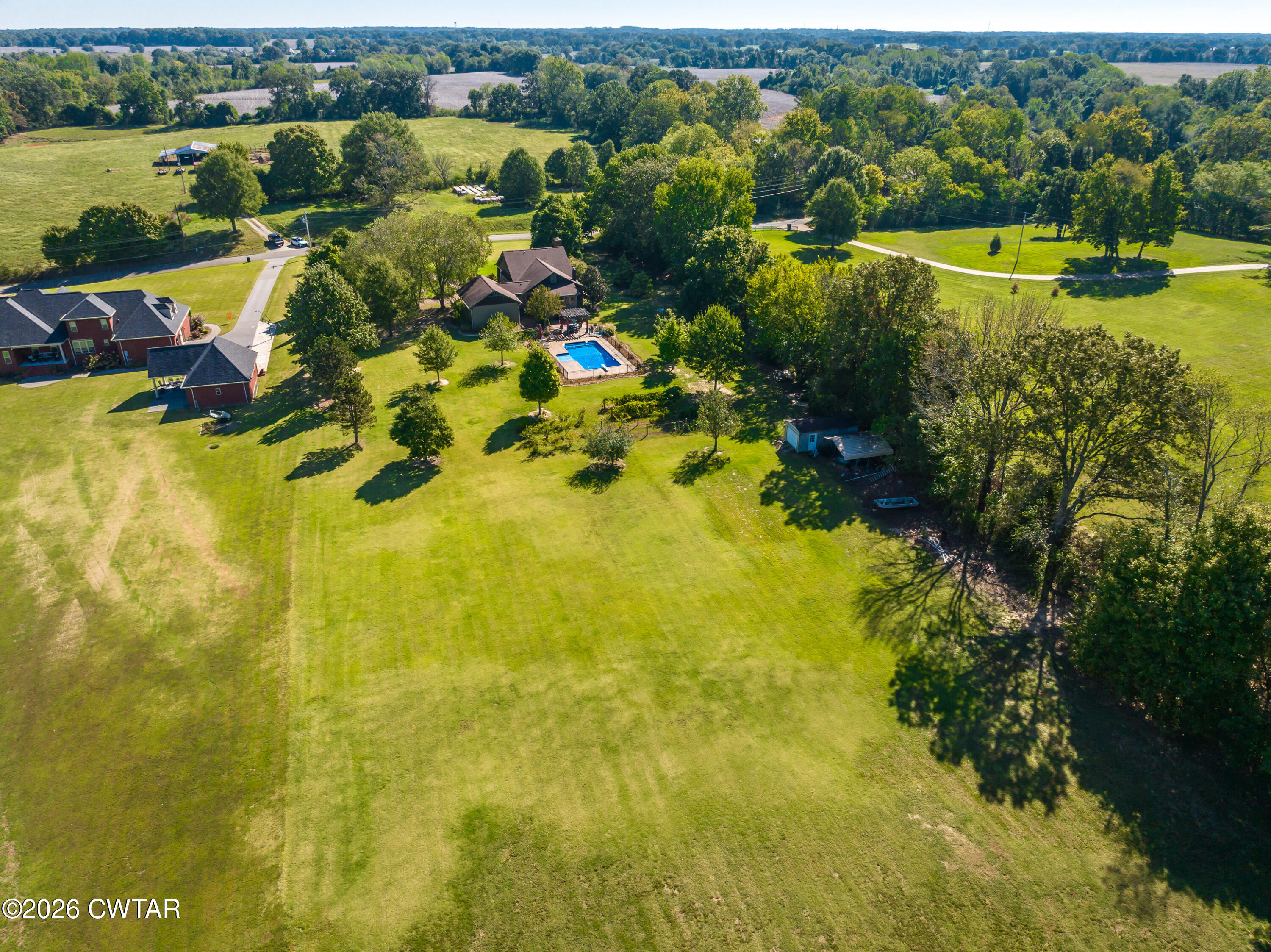 117 Pleasant Hill Road Humboldt, TN 38343 - Photo 40 of 45 a view of a lake with a houses