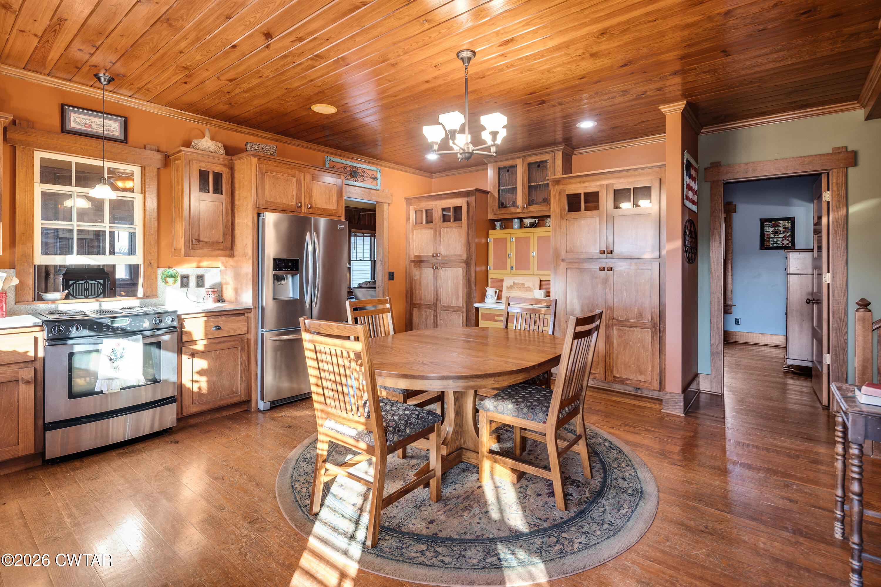 117 Pleasant Hill Road Humboldt, TN 38343 - Photo 4 of 45 a view of a dining room with furniture and wooden floor