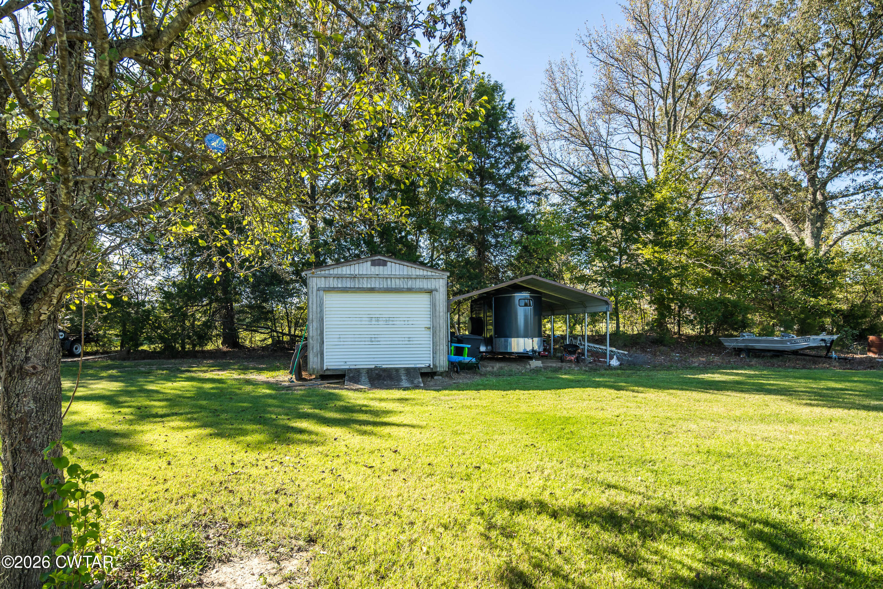 117 Pleasant Hill Road Humboldt, TN 38343 - Photo 42 of 45 a view of a house with swimming pool