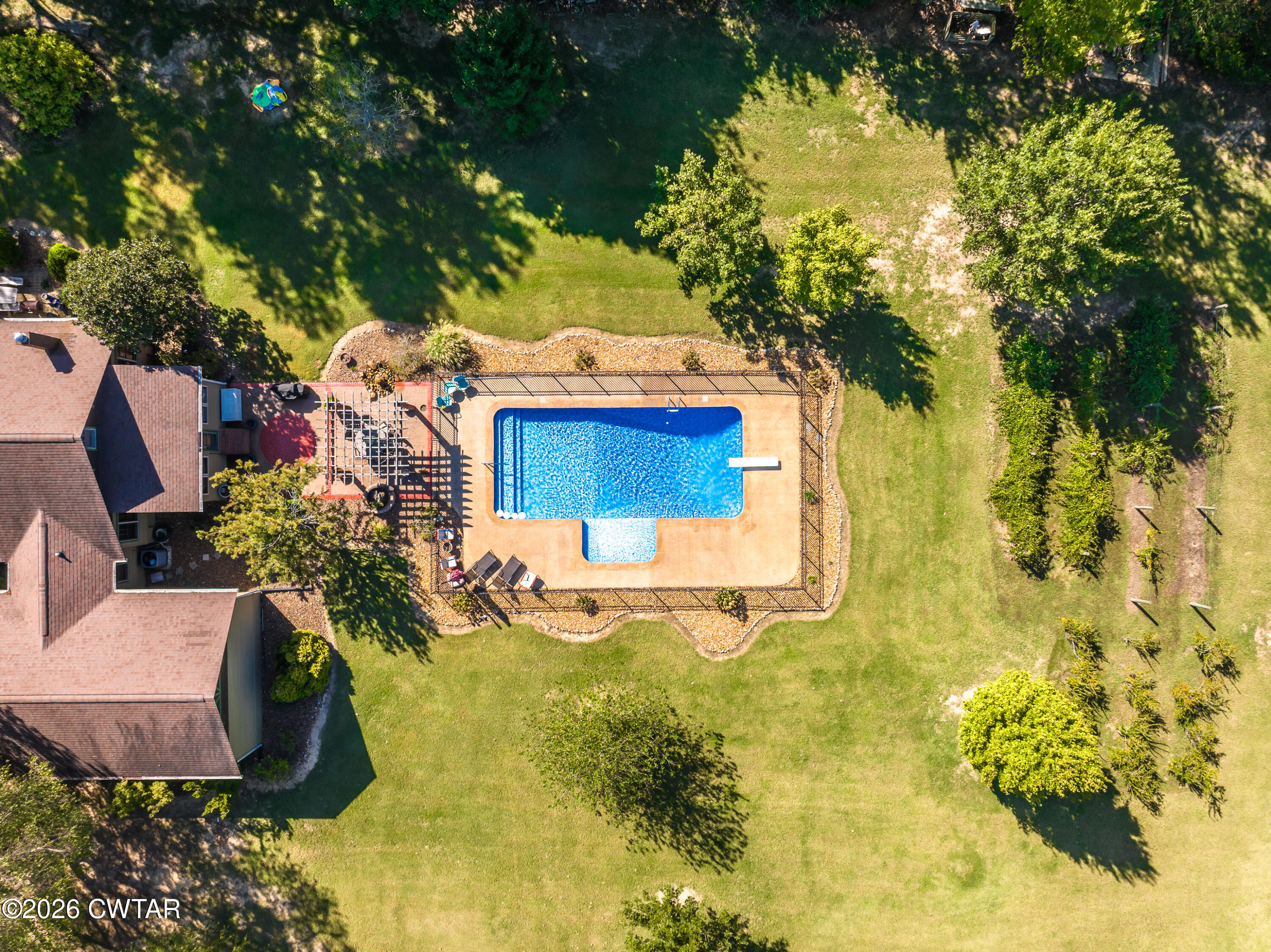 117 Pleasant Hill Road Humboldt, TN 38343 - Photo 43 of 45 a view of a house with a yard and sitting area