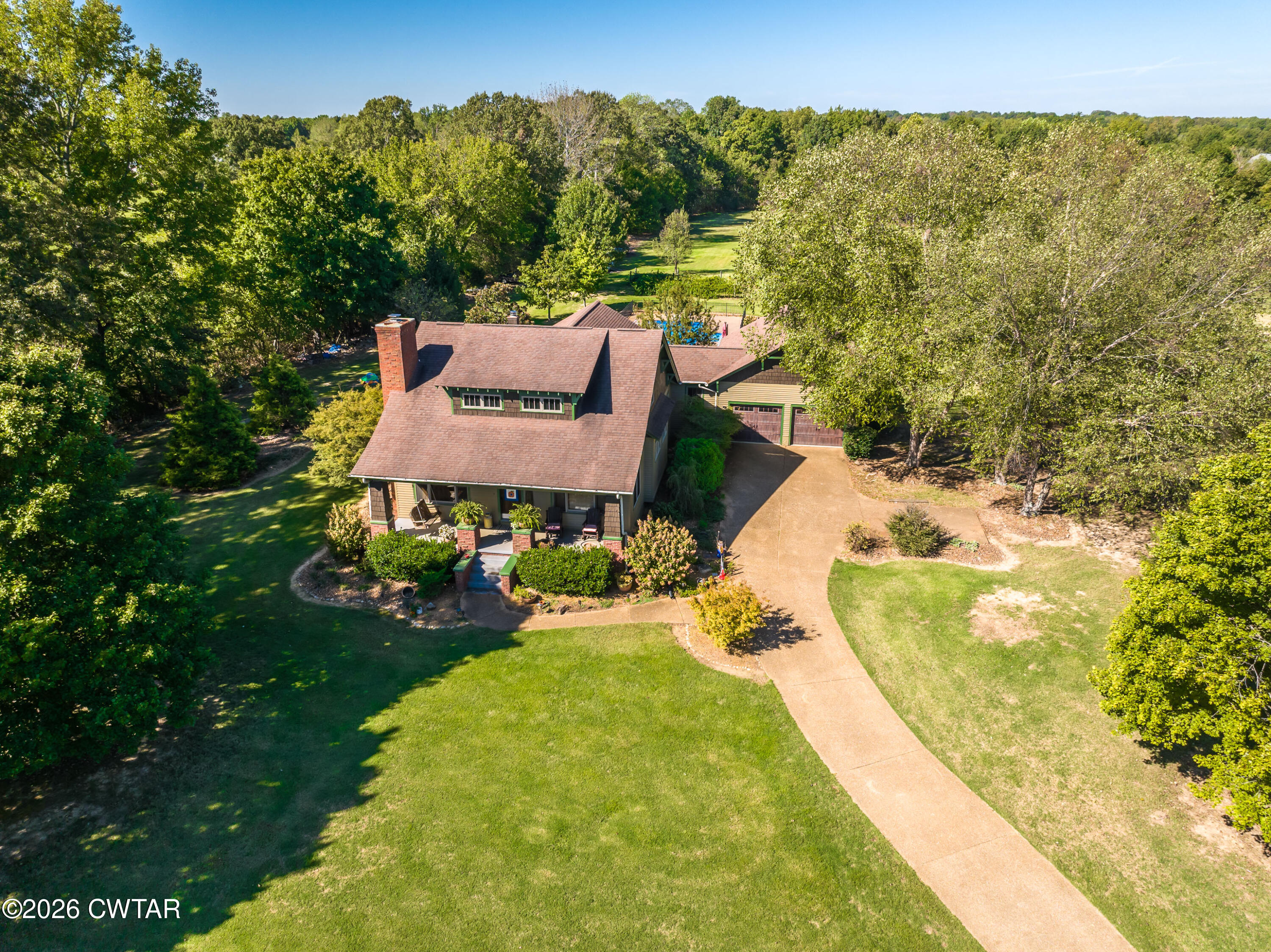 117 Pleasant Hill Road Humboldt, TN 38343 - Photo 44 of 45 a view of a swimming pool with a garden