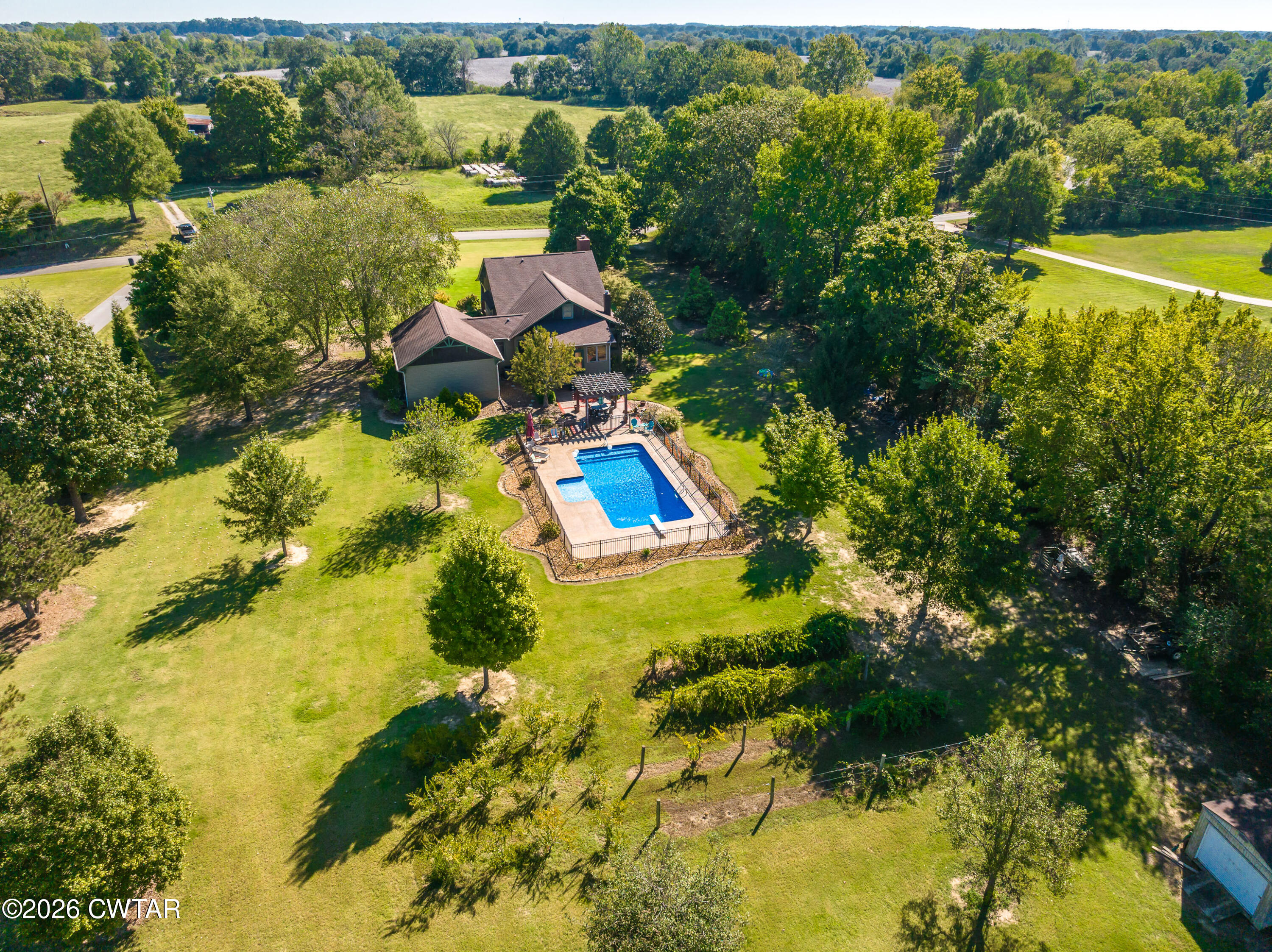 117 Pleasant Hill Road Humboldt, TN 38343 - Photo 45 of 45 a view of a lake with a houses