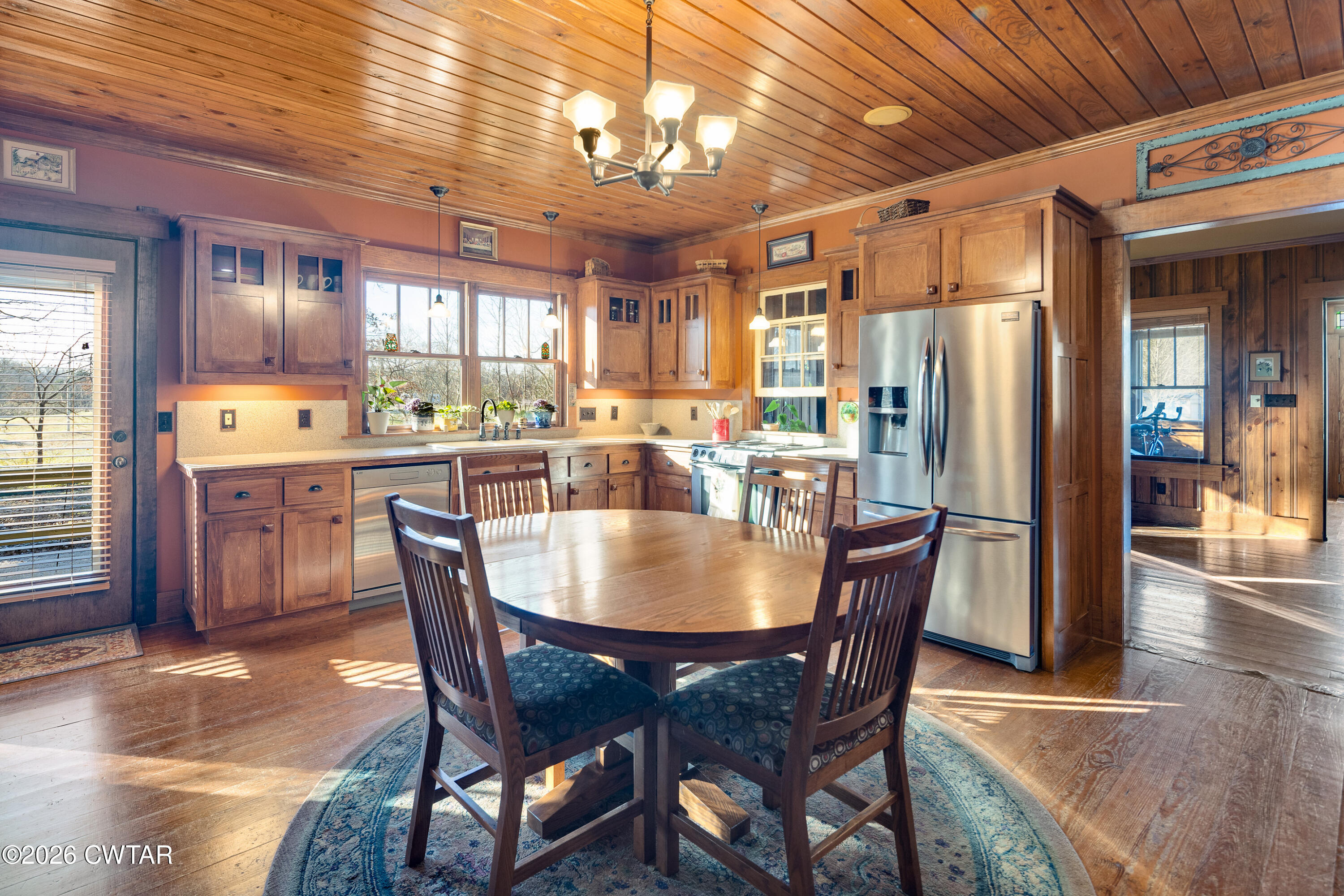 117 Pleasant Hill Road Humboldt, TN 38343 - Photo 6 of 45 a dining room with furniture a chandelier and window