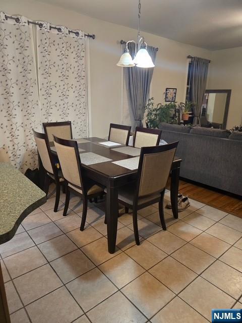 9 Schuyler Court, Unit R2 Kearny, NJ 07032 - Photo 4 of 6 a view of a dining room with furniture