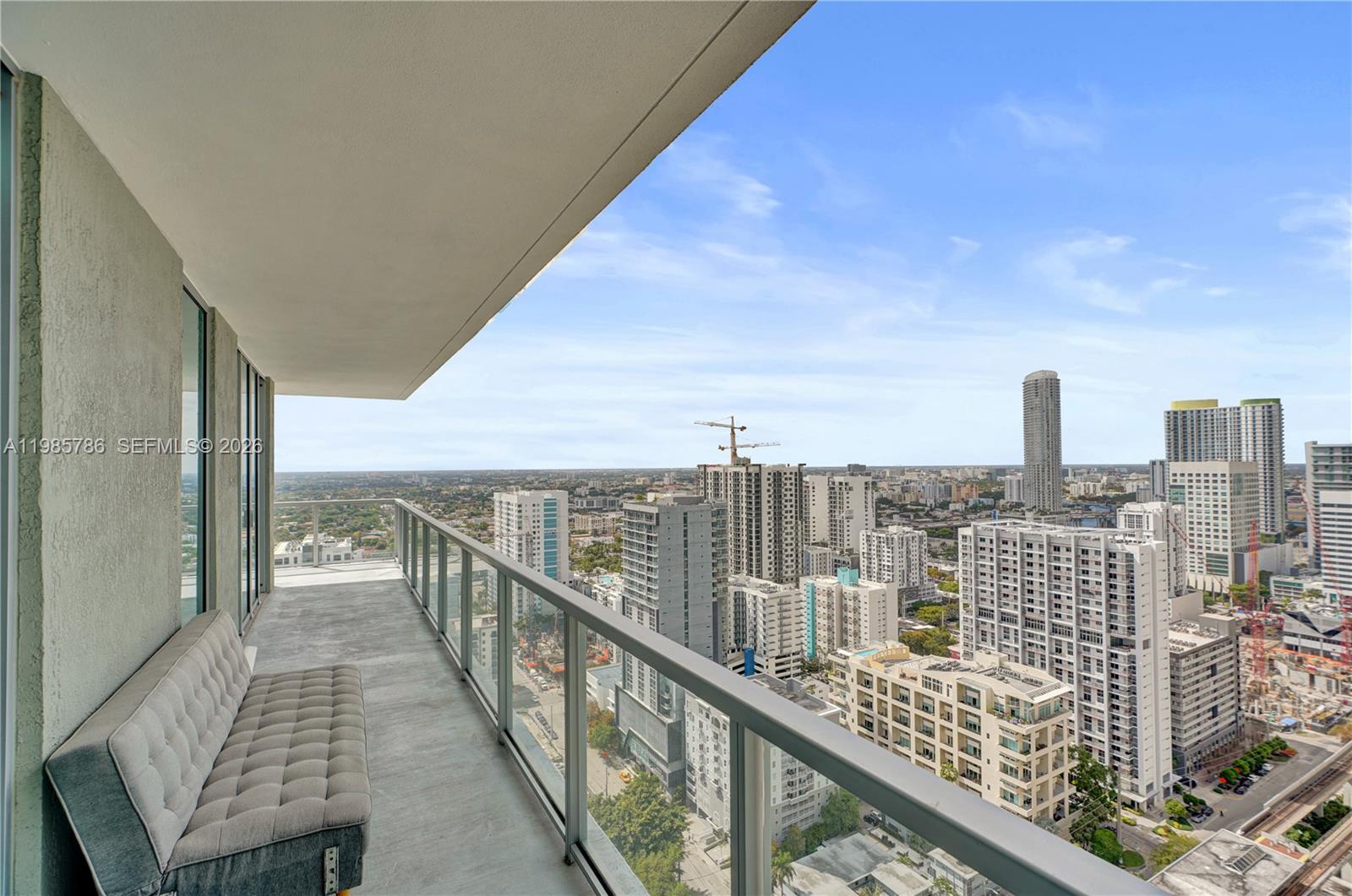 79 Southwest 12th Street, Unit 3412S Miami, FL 33130 - Photo 34 of 37 a view of a balcony with city