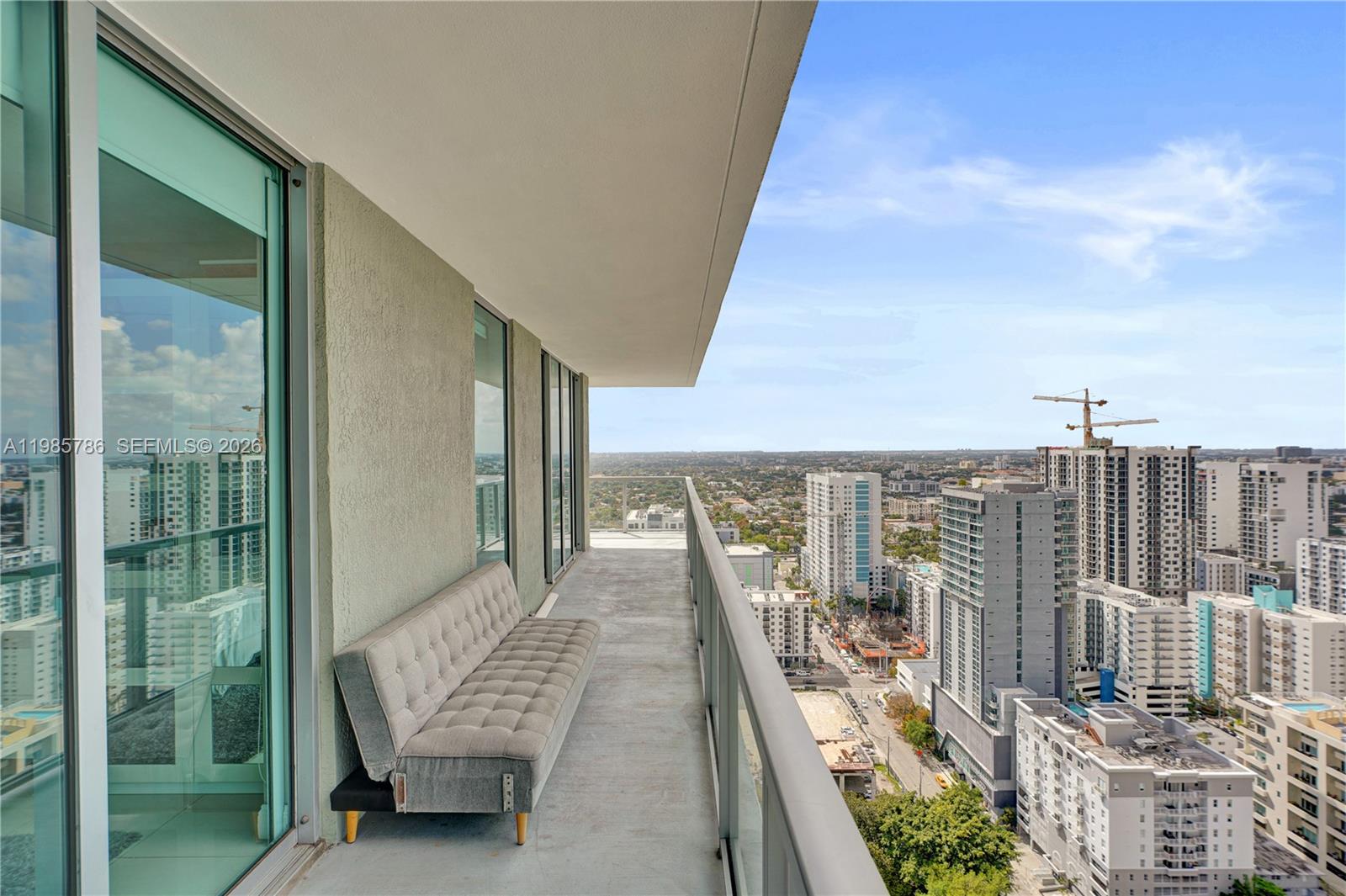 79 Southwest 12th Street, Unit 3412S Miami, FL 33130 - Photo 35 of 37 a view of balcony with furniture