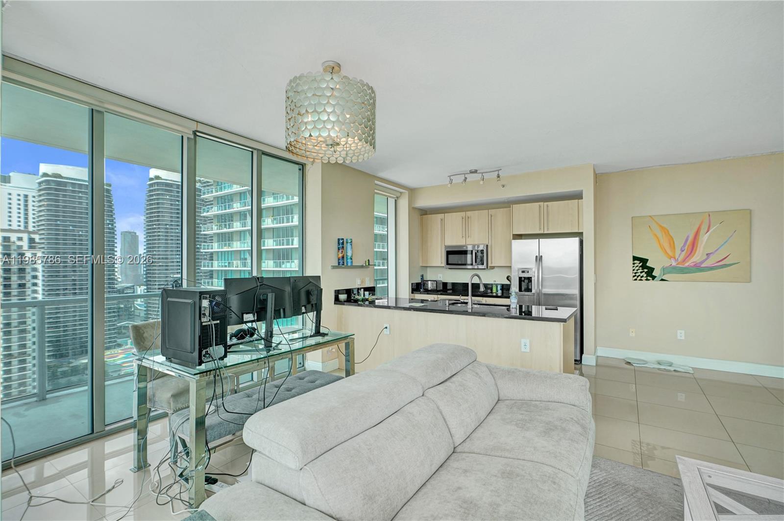 79 Southwest 12th Street, Unit 3412S Miami, FL 33130 - Photo 8 of 37 a living room with furniture