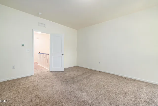 an empty room with an entryway
